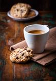 Cup of espresso and chocolate chip cookies