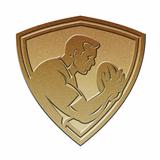 rugby player shield metallic gold
