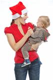 Young mother spending Christmas time with baby