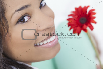 African American Woman With Red Flower