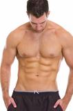 Muscular guy showing abdominal muscles