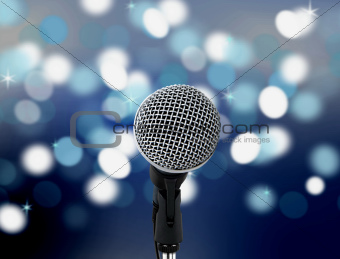 microphone with blur lights in background
