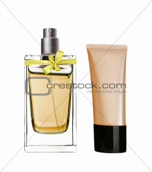 women's perfume in beautiful bottle and liquid makeup foundation