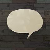 Speech bubble on wooden texture background. Vector illustration,