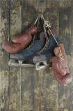 old boxing  and and hockey skates pendant on peg 