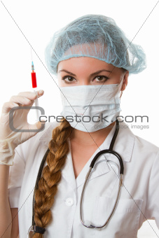 Doctor or Nurse in a white coat with injection