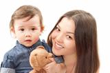 Happy mother and baby girl with toy Teddy bear