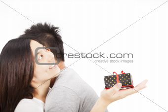 Young happy asian  couple with gift  and isolated on white