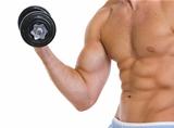 Closeup on muscular man workout biceps with dumbbell