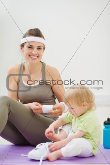 Mother and baby spending time in gym