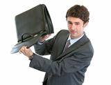 Concerned businessman shakes out something from suitcase