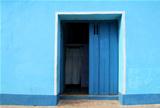 blue wall with a door