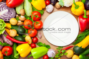 Fresh Organic Vegetables Around White Plate
