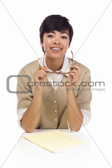 Pretty Smiling Mixed Race Female Student at Desk with Books Isolated on a White Background.