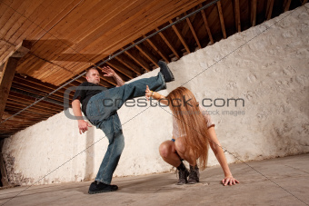 Man Kicks Young Woman