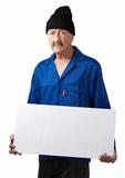 Serious worker with blank poster