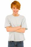 teenage boy with arms folded