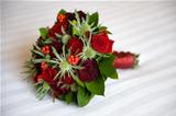 wedding bouquet of roses and eryngium