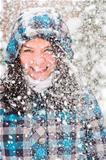 Out of focus picture of a woman with a lot of snowflakes