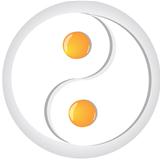 Yin-yang symbol made from fried eggs on plate