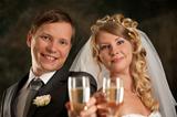 happy bride and groom with champagne