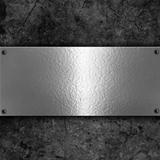 Grunge background with metal plate