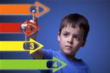 Child pointing to colorful arrows - with copy space