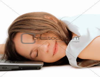 Woman sleeping on the laptop