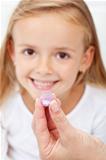 Girl receiving homeopathic medication