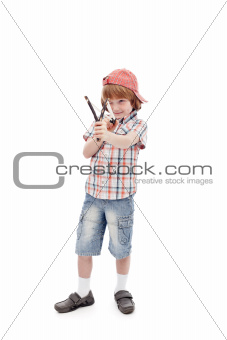 Young boy with sling aiming