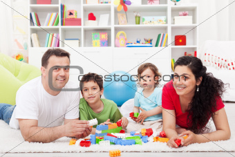 Kids with their parents playing