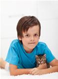 Young boy with kitten