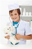 Little boy playing veterinary doctor