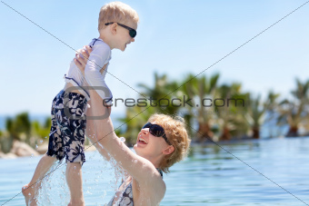 mother and her son in the pool