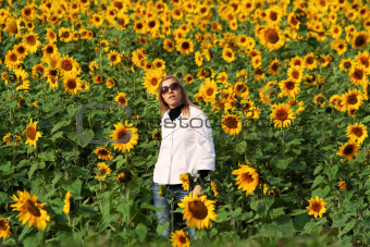 Beautiful lady with sunflowers