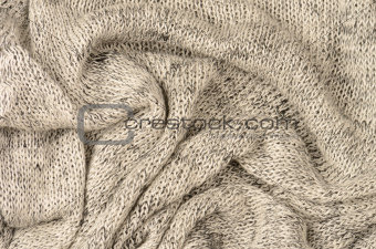 close up grey knitted pullover background