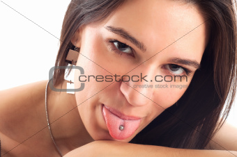 young woman showing het tongue with piercing isolated on white b