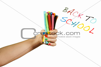 Colorful markers in hand