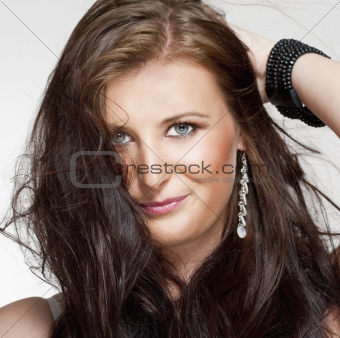  portrait of a young beautiful woman with brown hair looking