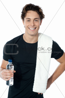 Handsome muscular man with towel