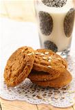 oat cookies biscuits and a glass of milk