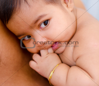 Baby lying on daddy chest