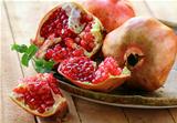 pomegranate ripe fruit on a wooden table