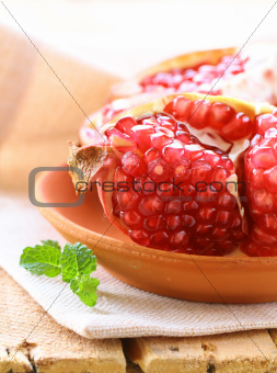 pomegranate ripe fruit on a wooden table