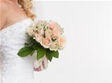 closeup of bride hands holding beautiful wedding bouquet