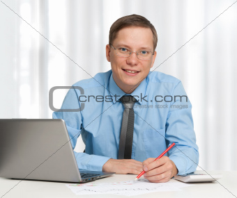 Young business man smiling