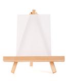 Wooden easel with white canvas