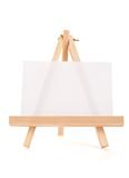 Wooden easel with white canvas
