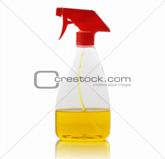 spray bottle with yellow liquid 