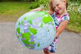 Girl holding an earth globe